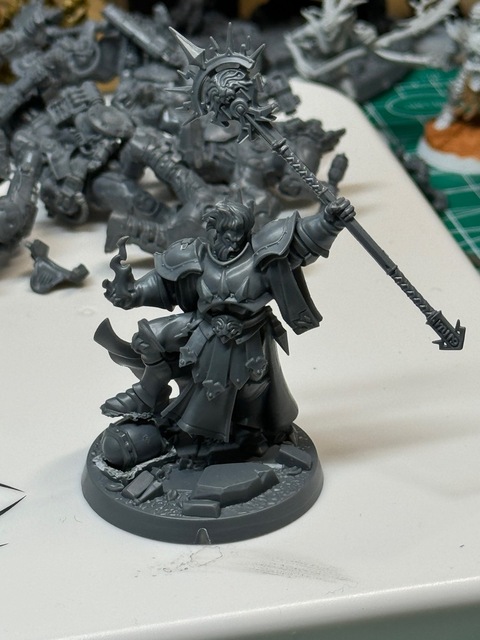 Photo of an Averon Stormsire miniature, with a ball replaced under its foot where the original base has been cut away