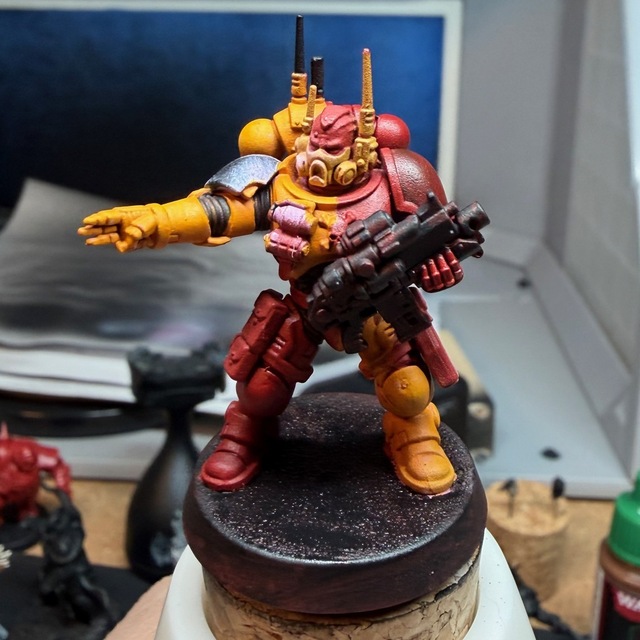 The same space marine now has its base painted black to remove the distracting block of red
